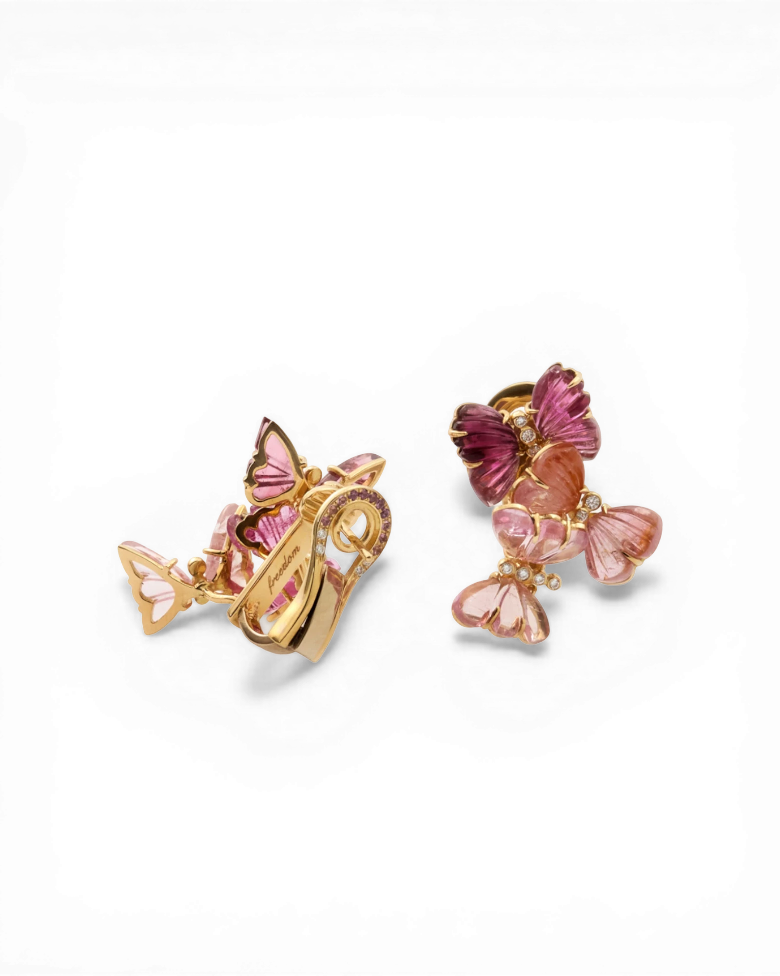 Aveluene 18k yellow gold earrings with hand-carved tourmaline flowers, diamonds, and pink sapphires. Butterfly motifs.